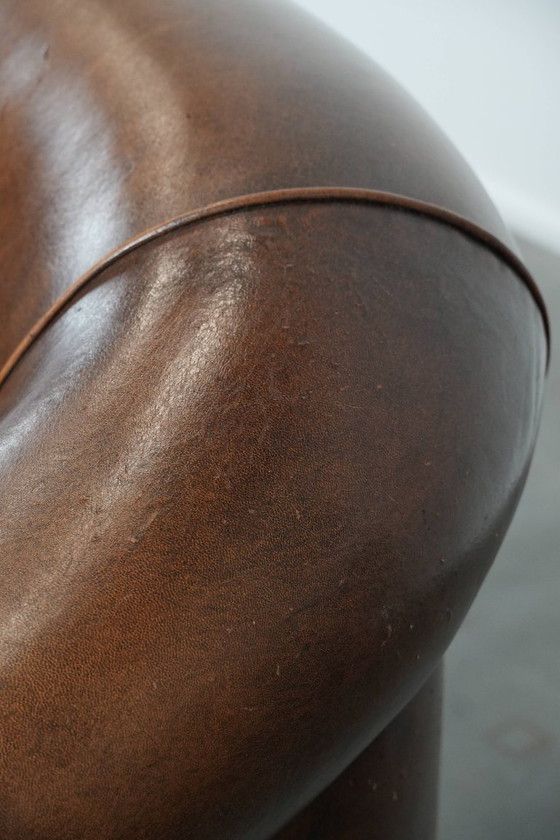 Image 1 of Vintage stoere 2-zits clubbank gemaakt van schapenleer