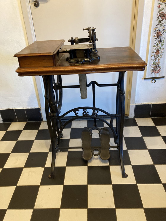 Image 1 of Antique step sewing machine from 1873