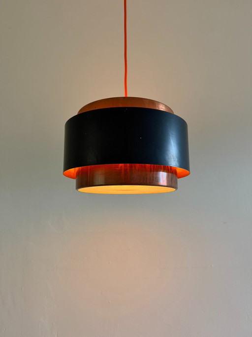 Lampada a sospensione moderna in nero e rame