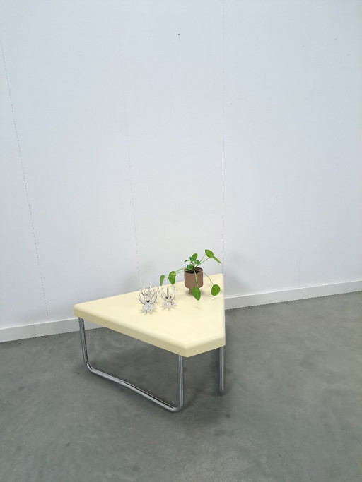 Space age triangular plastic table with chrome tubular frame legs