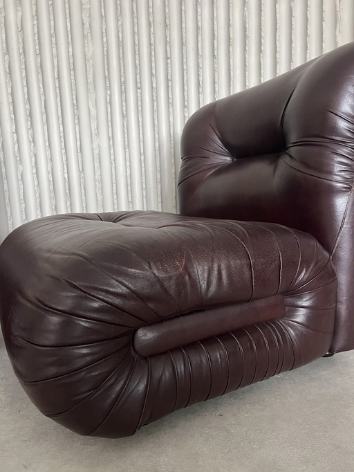 Burgundy Italian leather lounge chairs, 6 available