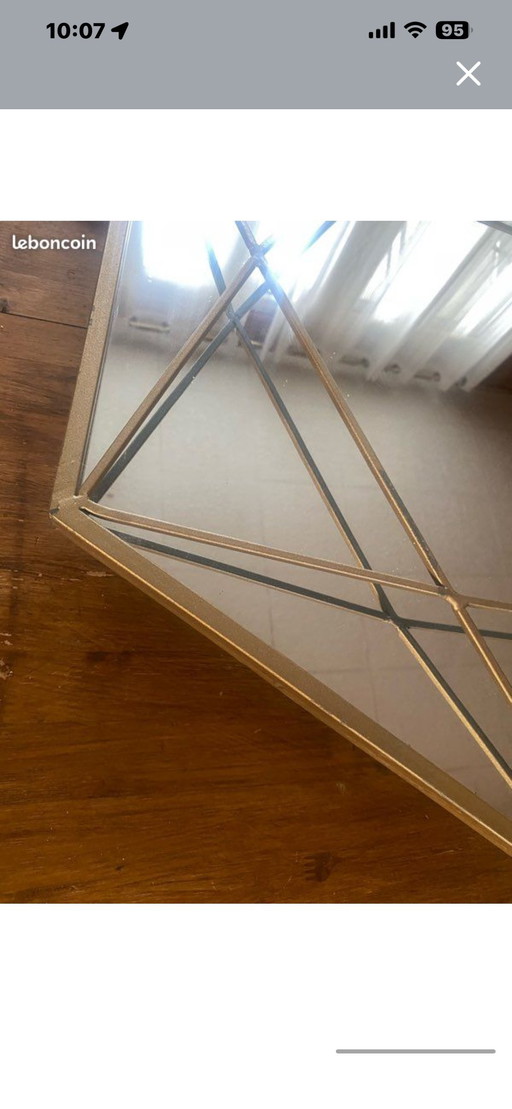 Gran espejo Art Déco en latón dorado.