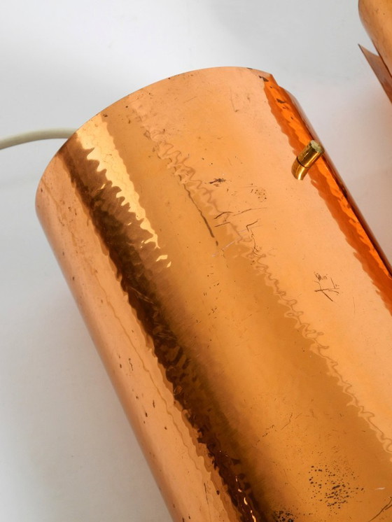 Image 1 of Two rare mid-century tube pendant lamps consisting of two screwed-together copper bowls