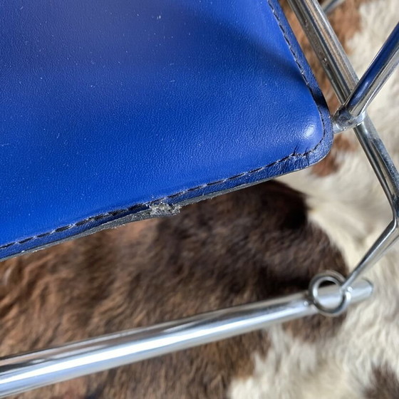 Image 1 of Set van 4 vintage stoelen in blauw imitatieleer en verchroomd metaal