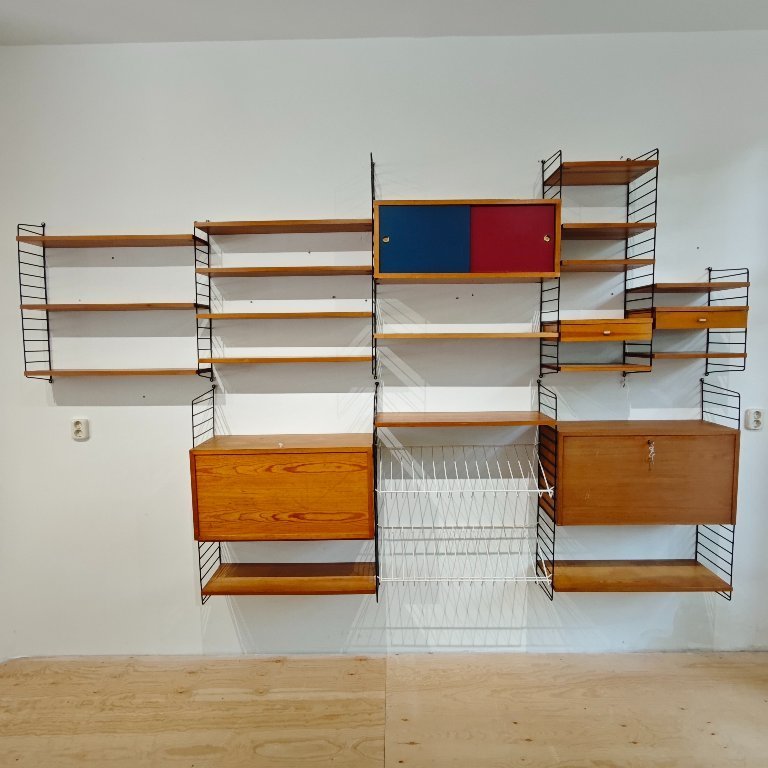 Vintage String wall system cabinet Nils Strinning | €1,550 | Whoppah