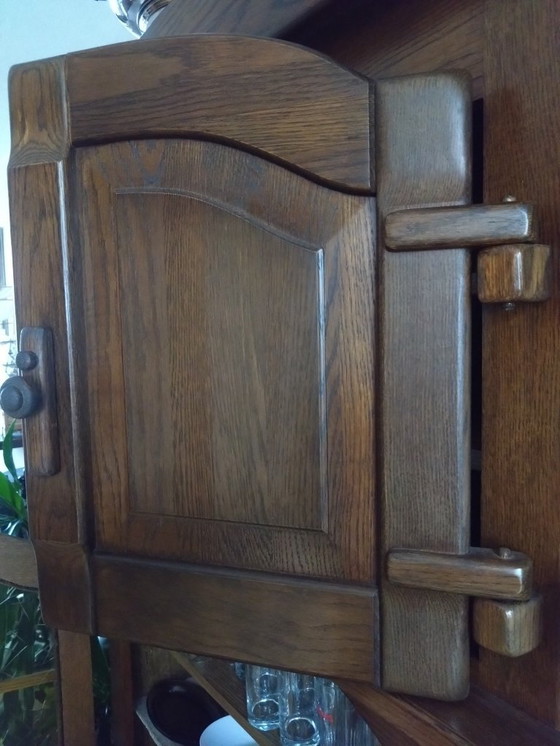 Image 1 of Houten kastenwand met glaskast en klepkast