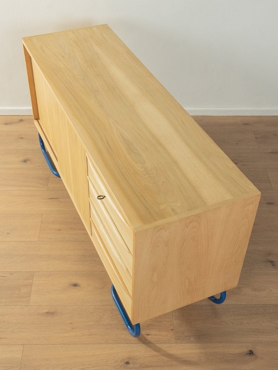Image 1 of Dressoir uit 1950 met blauwe bauhaus poten