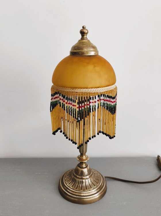 Image 1 of Antieke gouden tafellamp met kwastjes