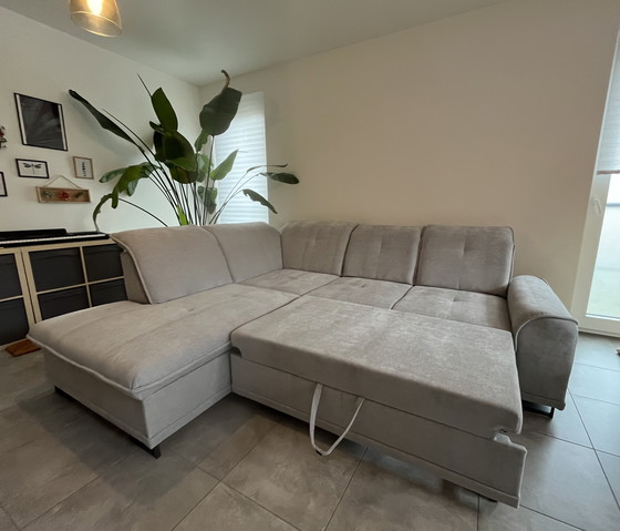 Image 1 of Nouveau canapé gris moderne convertible en lit - nouveau prix 1899 €