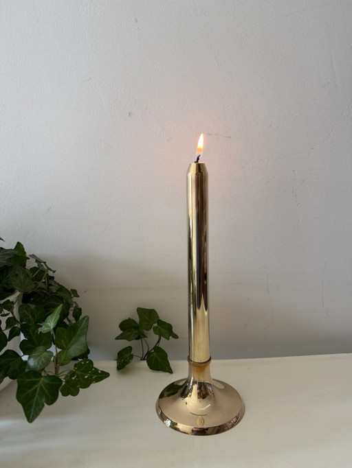Brass spring-loaded candlestick