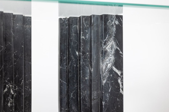 Image 1 of Pair of marble and glass top console tables. 1980s.