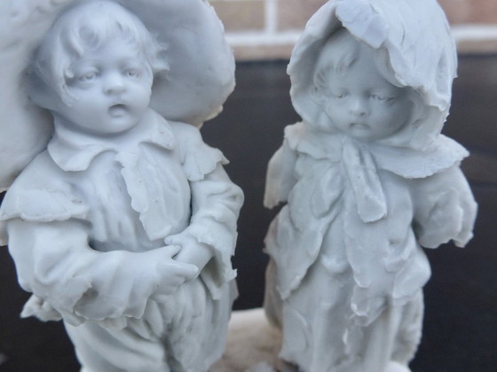 Image 1 of Luxury sponge porcelain figurine with gold leaf finish.