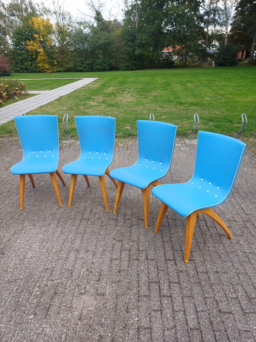 4 G J van Os swing chairs.