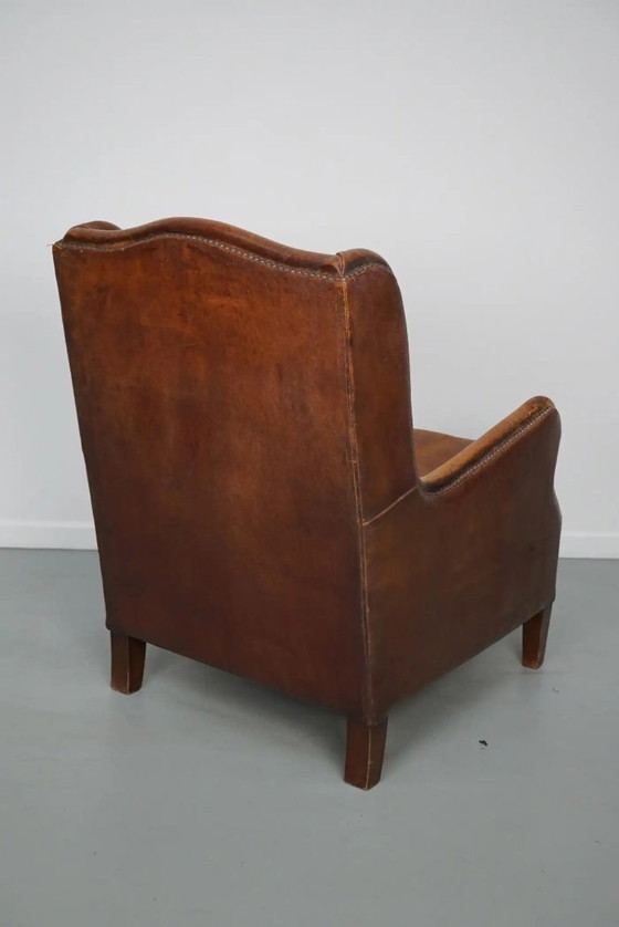 Image 1 of Vintage Nederlandse clubfauteuil van cognackleurig leer