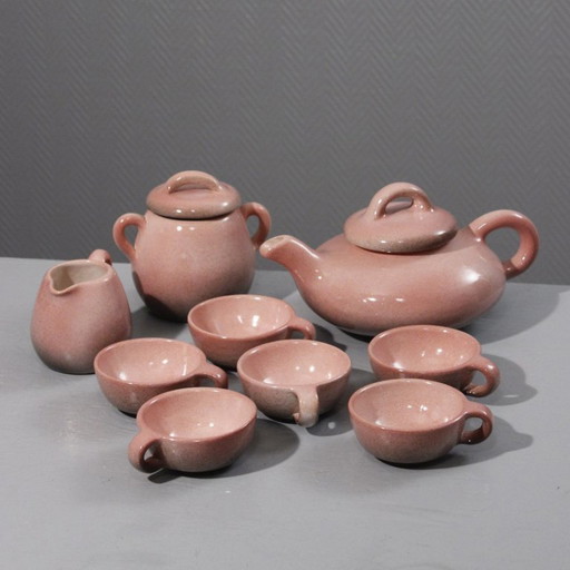 9-piece ceramic coffee service, Max Idlas speckled pink glaze, France, 20th century