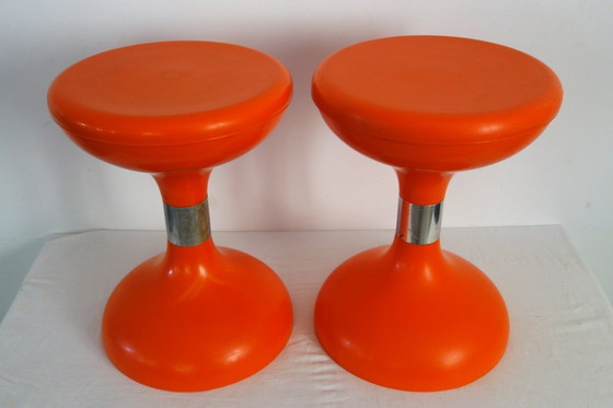 Image 1 of 2 orange diabolo stools from the 70s