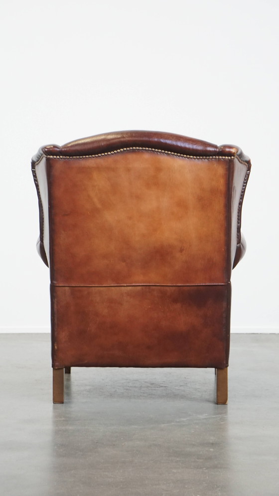 Image 1 of Fauteuil à oreilles vintage en cuir de mouton