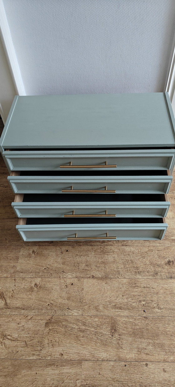 Image 1 of chest of drawers - soft green with brass handles