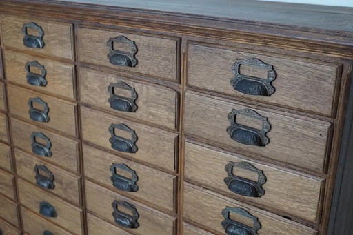 Antique French oak archive/apothecary cabinet by Chouanard, ca. 1910