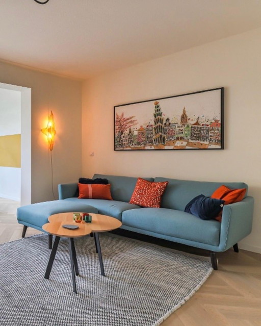 Design on Stock - Byen - 3-Sitzer-Sofa + Fußhocker