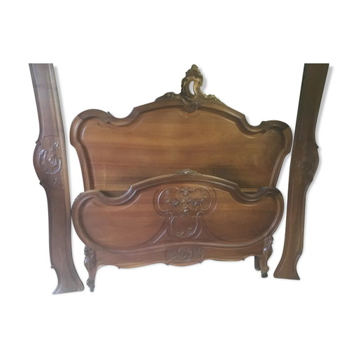 Letto stile Luigi XV in noce intagliato