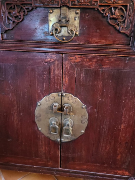 Image 1 of Antique Chinese cabinet in solid wood – brass fittings