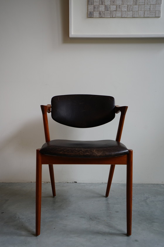 Image 1 of 6 Kai Kristiansen stoelen | Model 42 | Teak Leder patina