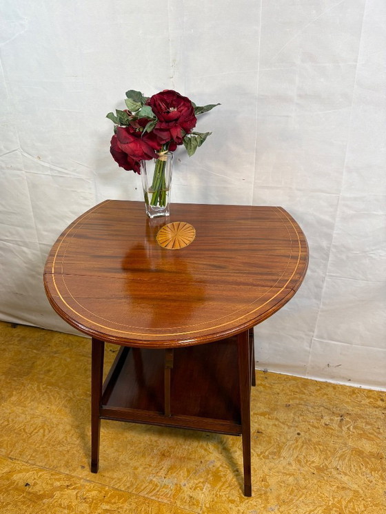 Image 1 of Antique Edwardian Mahogany Oval Drop Leaf Side Table (Circa 1900–1930)  A beautiful antique Edwardian oval drop leaf side table 