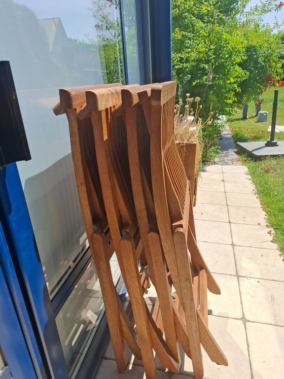 Image 1 of Lot de 4 chaises de jardin pliantes en Teck massif + 4 coussins de chaises à dossier offerts