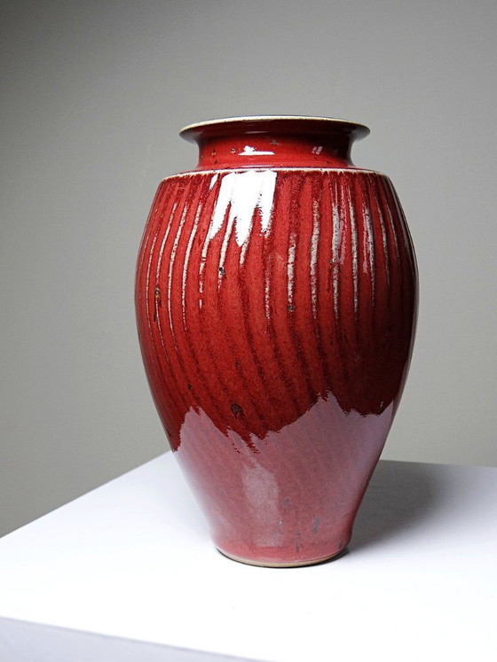 Image 1 of Oxblood-blood glazed stoneware vase with ribs, 20th-century workshop piece