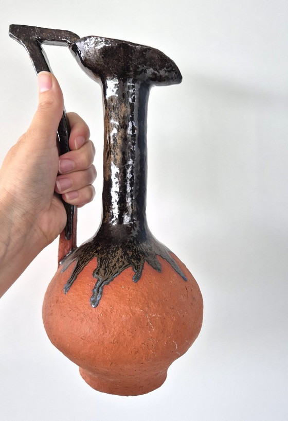 Terracotta ceramic vase with dark metallic drip glaze (photo 6 of 6)