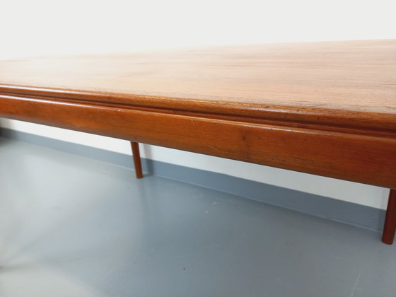 Image 1 of Scandinavian rectangular vintage dining table by Johannes Andersen for Samcom from the 60s in teak with integrated extensions