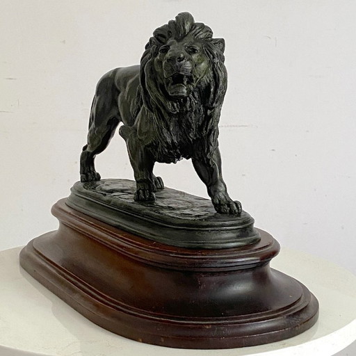 Sculpture en bronze d'un lion marchant, par Édouard Paul DELABRIERRE (1829-1912)