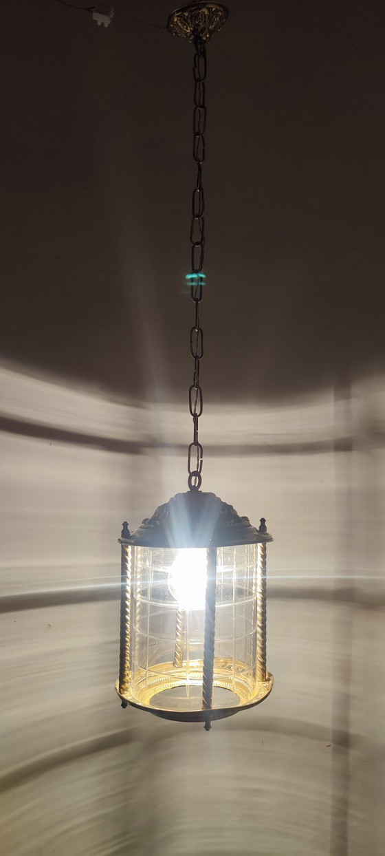 Image 1 of Plafonnier en laiton et cristal. Espagne, années 1940.