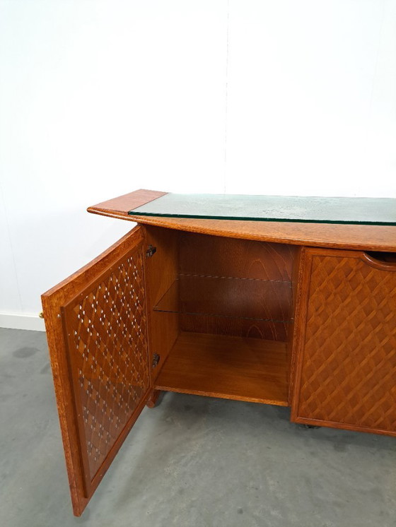 Image 1 of Bar dressoir met uitschuifbare bar en glazen blad