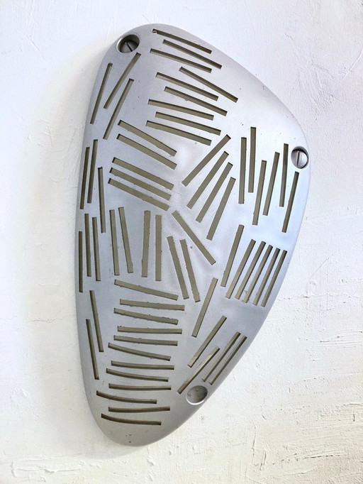 Wall CD holder The Stone by Guzzini Design Enzo Calabrese 90s