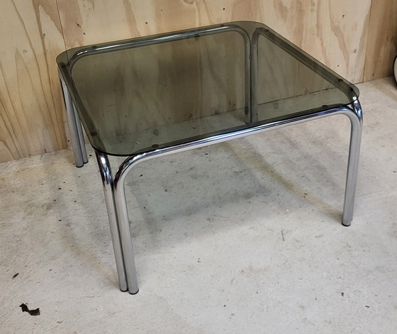 Image 1 of Tavolino da caffè in vetro fumé con struttura tubolare cromata