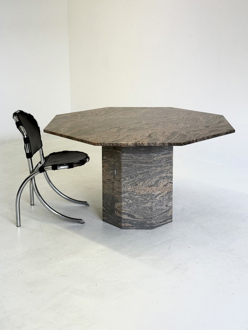 Vintage octagonal dining table in granite / natural stone