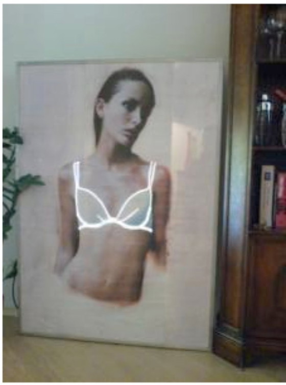 Image 1 of Daniële Buetti: Work 1999, Untitled, size 117x84x10.2: A lady with a white bra with perforations