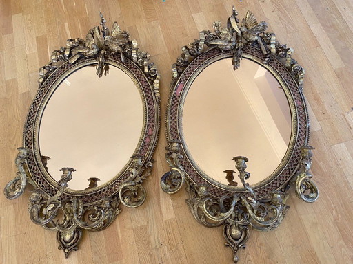 Two antique mirrors with candle holders, three of each