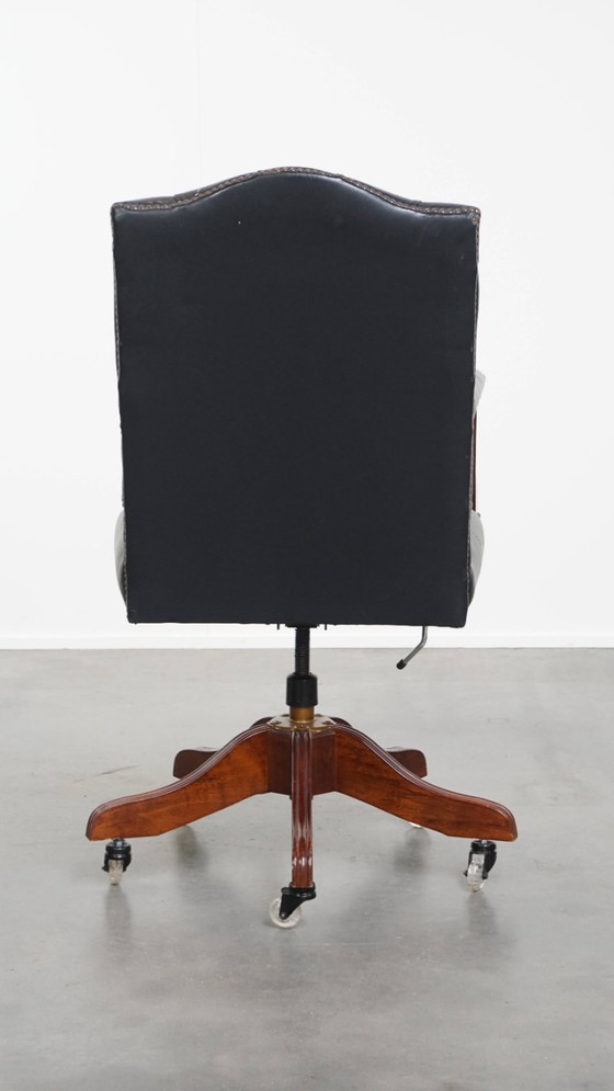 Image 1 of Dark blue/ black cowhide leather chesterfield office chair on wheels