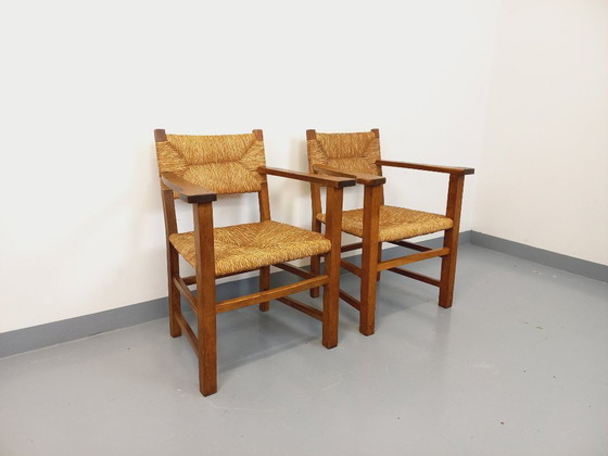 Image 1 of Suite van 2 vintage Brutalistische fauteuils in eiken en stro uit de jaren 60