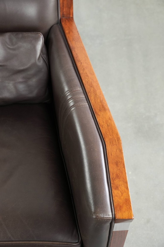 Image 1 of Luxe Schuitema Art Deco design set bestaande uit een fauteuil en hocker uit de Decoforma serie in chocolade bruin rundleer