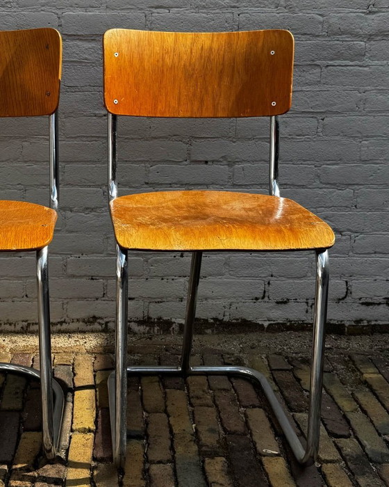 Image 1 of 2 sedie con struttura tubolare dal design vintage