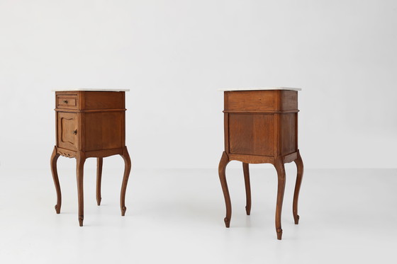 Image 1 of Pair of French Louis XV Style Nightstands in Oak with Carrara Marble Top