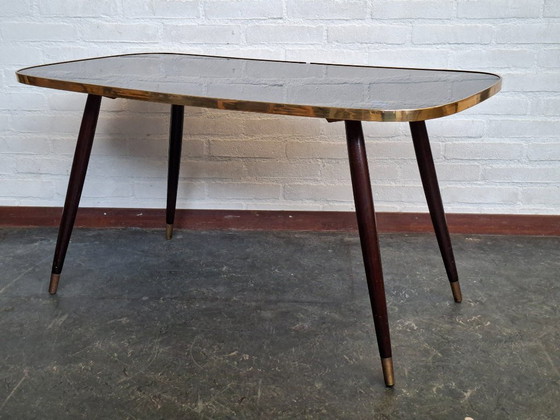 Image 1 of Tavolino da caffè vintage con piano in vetro e gambe inclinate