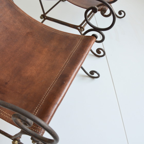 Image 1 of Paire de fauteuils en fer forgé et cuir vintage