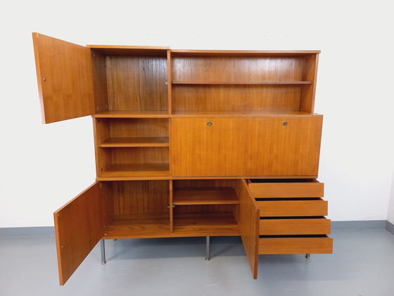 Image 1 of Louis Paolozzi's vintage modernist secretary bookcase for Monopoly in teak and metal from the 60s