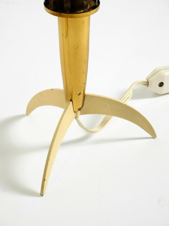 Image 1 of Two Mid-Century Modern rocket table lamps in brass and glass