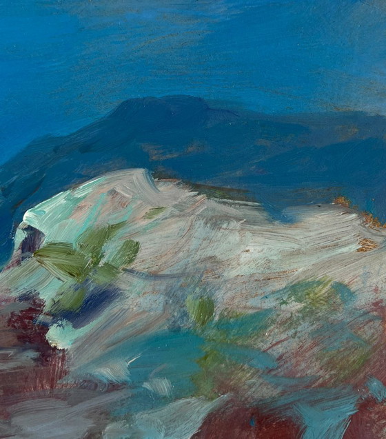 Image 1 of Una barca sulla costa rocciosa